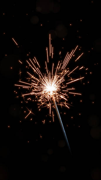 istock Festival Celebration Sparkler with Soft Golden Bokeh 2239481491