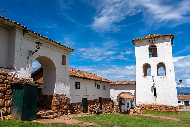 istock Colonial church in Chinchero, Peru, with white adobe bell tower 2239483591