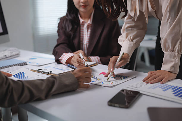 istock Businesswomen meeting collaborating financial data analysis 2239487669