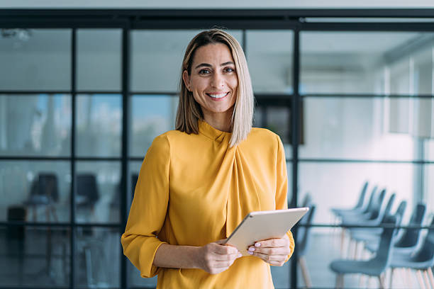 istock Confident businesswoman in modern office. 2239489302