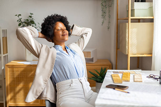 istock Black businesswoman relaxing at home office during break 2239490121