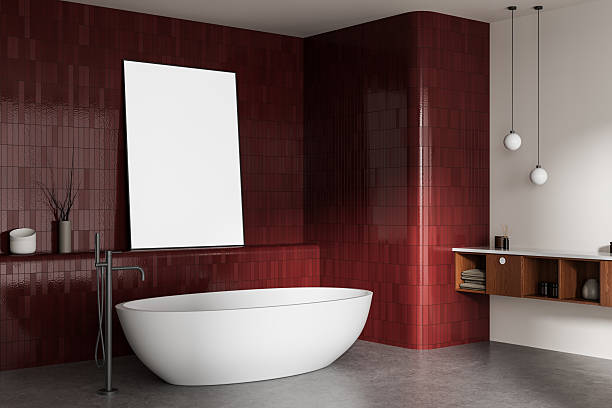 istock Contemporary bathroom interior with white bathtub, red tiled wall, large vertical poster mockup, and modern lighting in minimalistic design style. 3D Rendering 2239490371