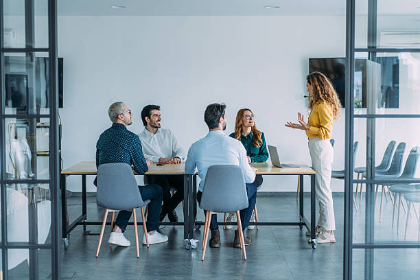 istock Team of professionals during a meeting. 2239490513