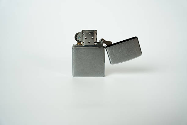 istock Open metal lighter isolated on white background 2239490735