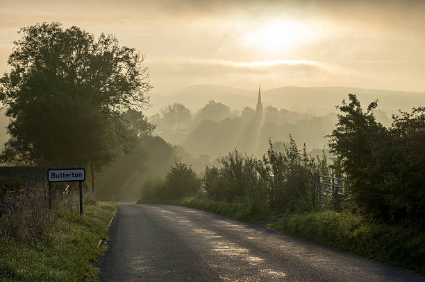 istock Misty Butterton Village at Sunrise 2239491142