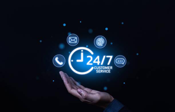 istock Hand holding glowing customer service icon with communication symbols, representing support center, online assistance, helpline, business care, and digital contact service concept. 2239492835