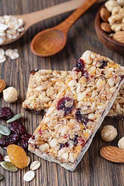 istock Granola bar on wooden background 2239497378