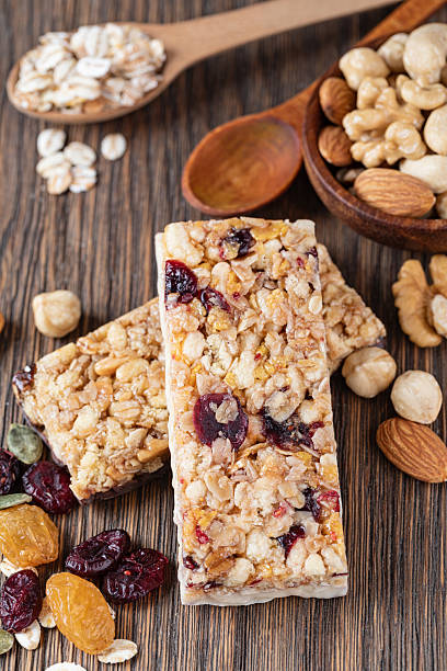 istock Granola bar on wooden background 2239497380