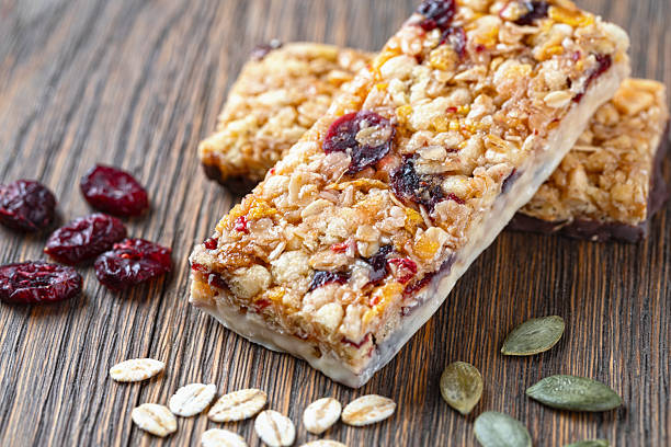 istock Granola bar on wooden background 2239497411