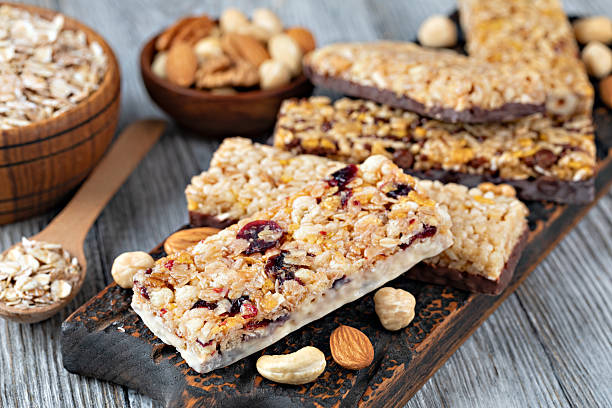 istock Granola bar on wooden background 2239497470