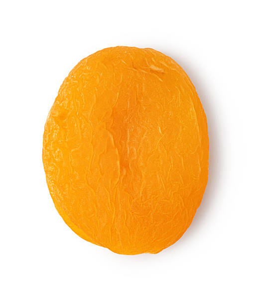 istock Dried apricots on white background. 2239497503