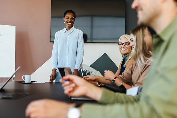 istock Diverse group of professionals in a productive business meeting setting 2239501242