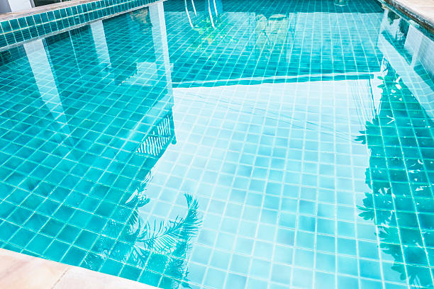 istock Clear swimming pool water background 2239511117