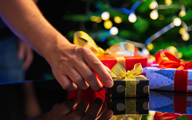 istock Christmas gift under the holiday tree 2239511535