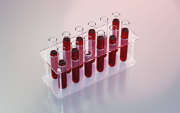 istock Test Tubes Filled with Blood Fluids at Different Scales on Reflective Infinite Background 2239512390