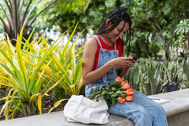 istock Woman enjoying mindful routine using phone in park 2239516517