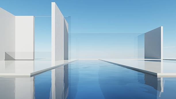 istock 3d render of abstract modern geometry architecture with empty cement floor and water, Minimal white building with exterior pool against blue sky background 2239519094