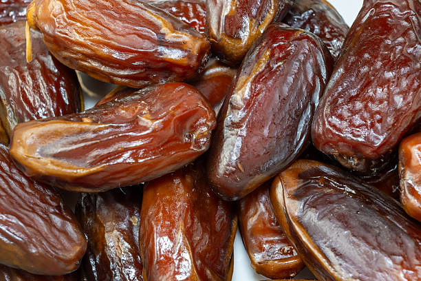 istock Pile of Glossy Medjool Dates 2239525598
