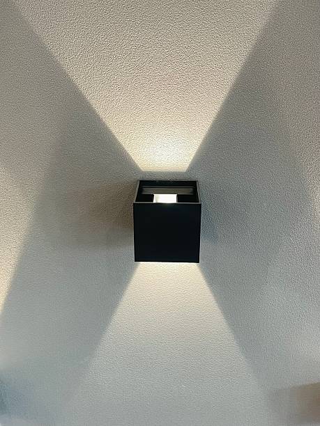 istock Ceiling Mounted Black Square Light Fixture with Wall Shadows 2239526760