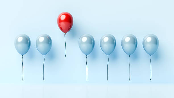 istock Unique achievement one red balloon rises higher than others, 3d render 2239529704