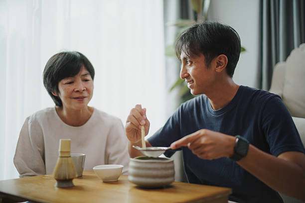 istock Matcha making with young man and mature woman. 2239541685