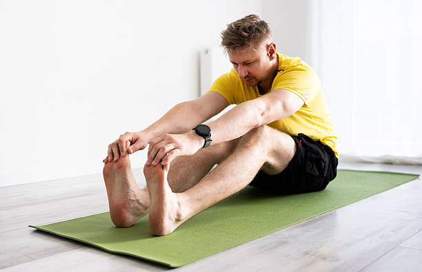 istock Sporty Young Man Doing Yoga Routine Practice 2239543675