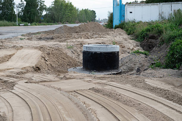 istock Construction site showing wastewater management system installation in a sandy trench 2239544287