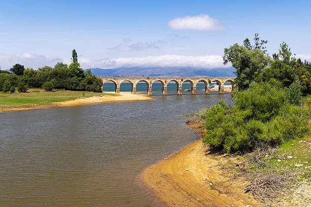 istock Arija reservoir with drought and stone arch bridge 2239544978