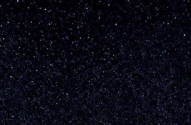 istock Starry night sky. Dark blue galaxy space. Glowing stars in the night. 2239545366
