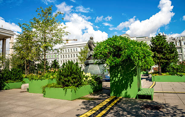Small Landscaped Garden With Planters Behind Fyodor Dostoevsky Statue at Russian State Library Entrance, Moscow, Russia, 9 August 2025