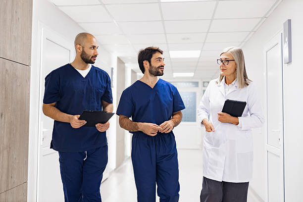 istock Doctors and Nurses in Hospital Corridor 2239549441