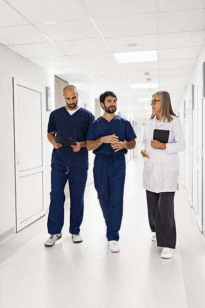 istock Doctors and Nurses in Hospital Corridor 2239549465
