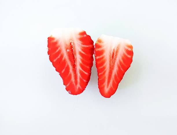 istock Strawberry sliced in halves 2239549496