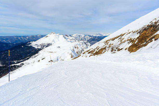 istock A scenic snowy mountain featuring a remarkable ski slope in the foreground 2239551171