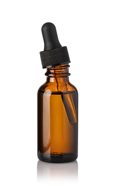 istock Drop falls from a pipette into a cosmetic bottle 2239551414