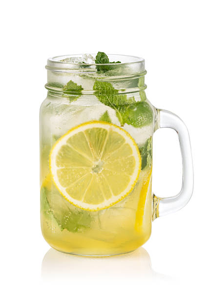 istock Glass with lemon lemonade and ice 2239553433