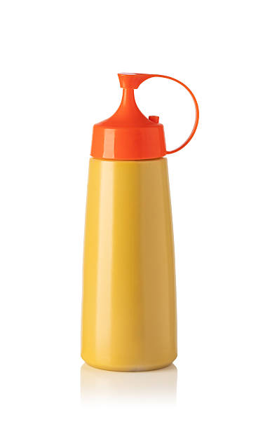 istock Yellow squeeze bottle with orange cap for sauces and condiments on white background 2239555043