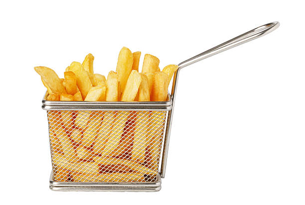 istock French fries overflowing a metallic basket with handle 2239555548