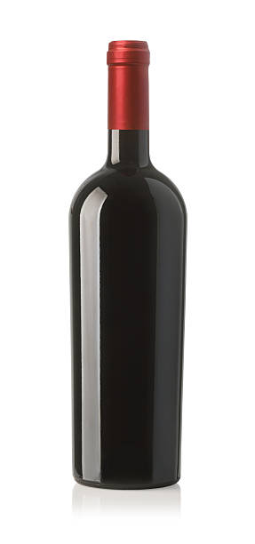 istock Elegant wine bottle with red capsule standing on white background 2239555595