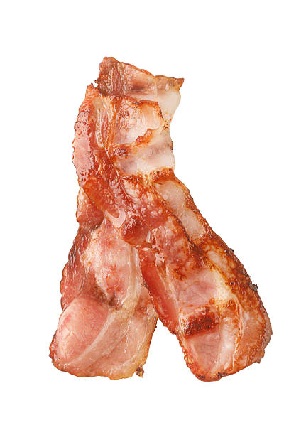 istock Crispy bacon strips making delicious breakfast food 2239556681