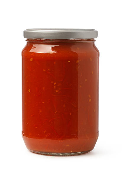 istock Glass jar filled with red tomato pasta sauce 2239556801