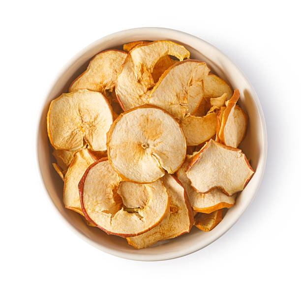 istock Dried apple slices in bowl providing healthy snack 2239556813