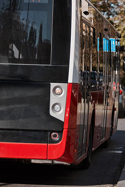 istock Red bus for public transportation on city streets. 2239557076