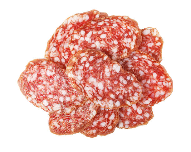 istock Salami slices pile on white background ready for eating 2239557299