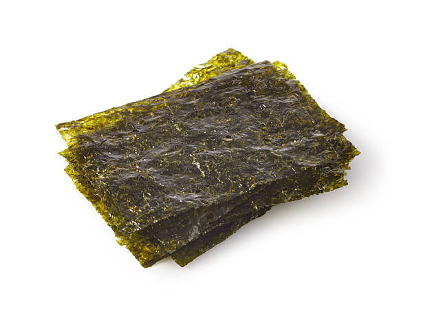 istock Dried nori seaweed sheets on white background 2239557306