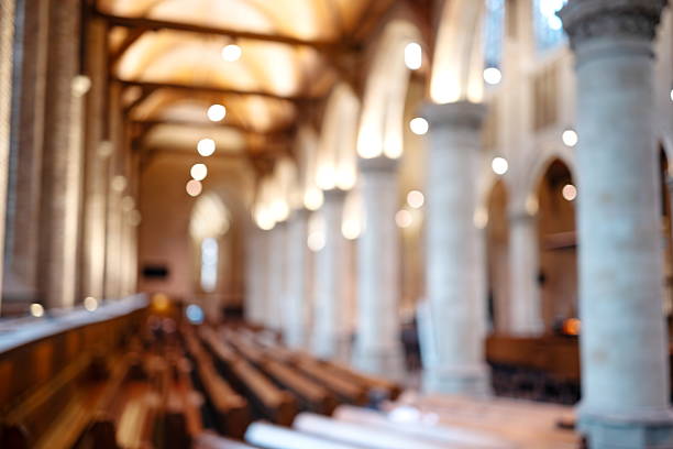 istock Blurry or defocused medieval European church interior. Wide angle view, abstract background, no people, selective focus 2239563602