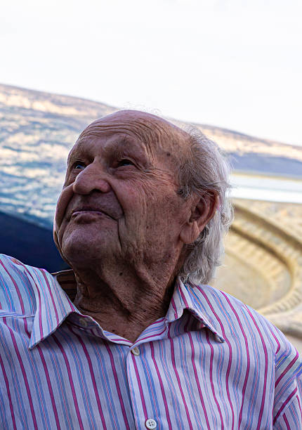 Elderly man with a thoughtful expression. Close-up portrait