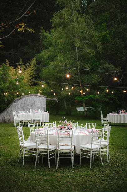 istock Wedding table with fresh flowers decoration. Forest / garden wedding 2239563701