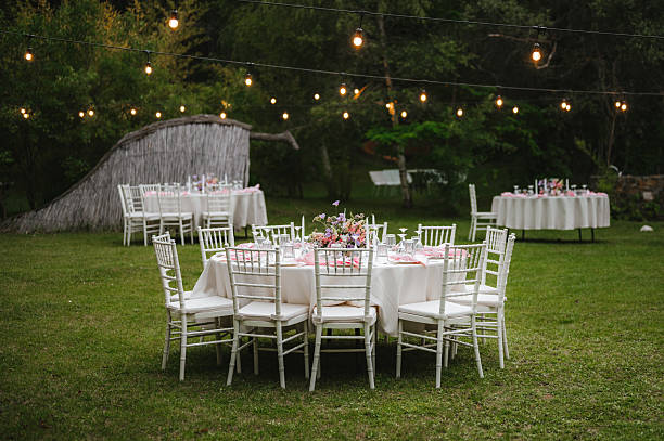 istock Wedding table with fresh flowers decoration. Forest / garden wedding 2239563704