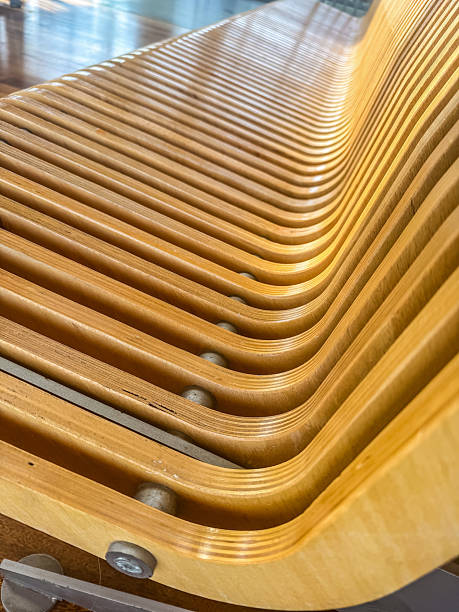 istock Wooden Bench Detail with Modern Curved Design 2239568848